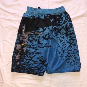 Blue, and black Batman swim trunks